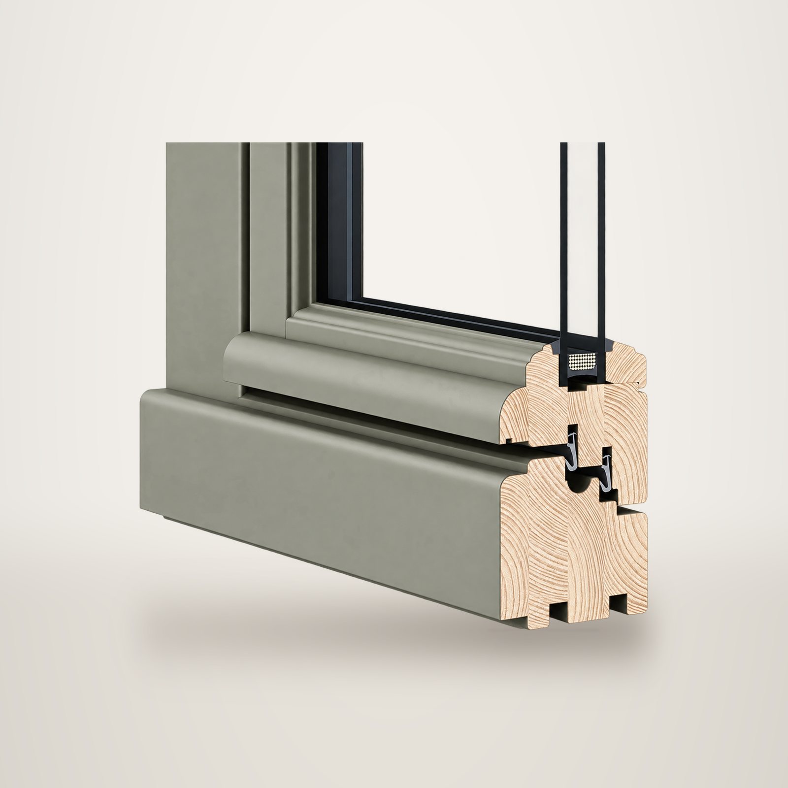 Vue en coupe d'un angle de fenêtre en bois peint en gris-vert, montrant les couches de bois lamellé, les joints et le double vitrage.